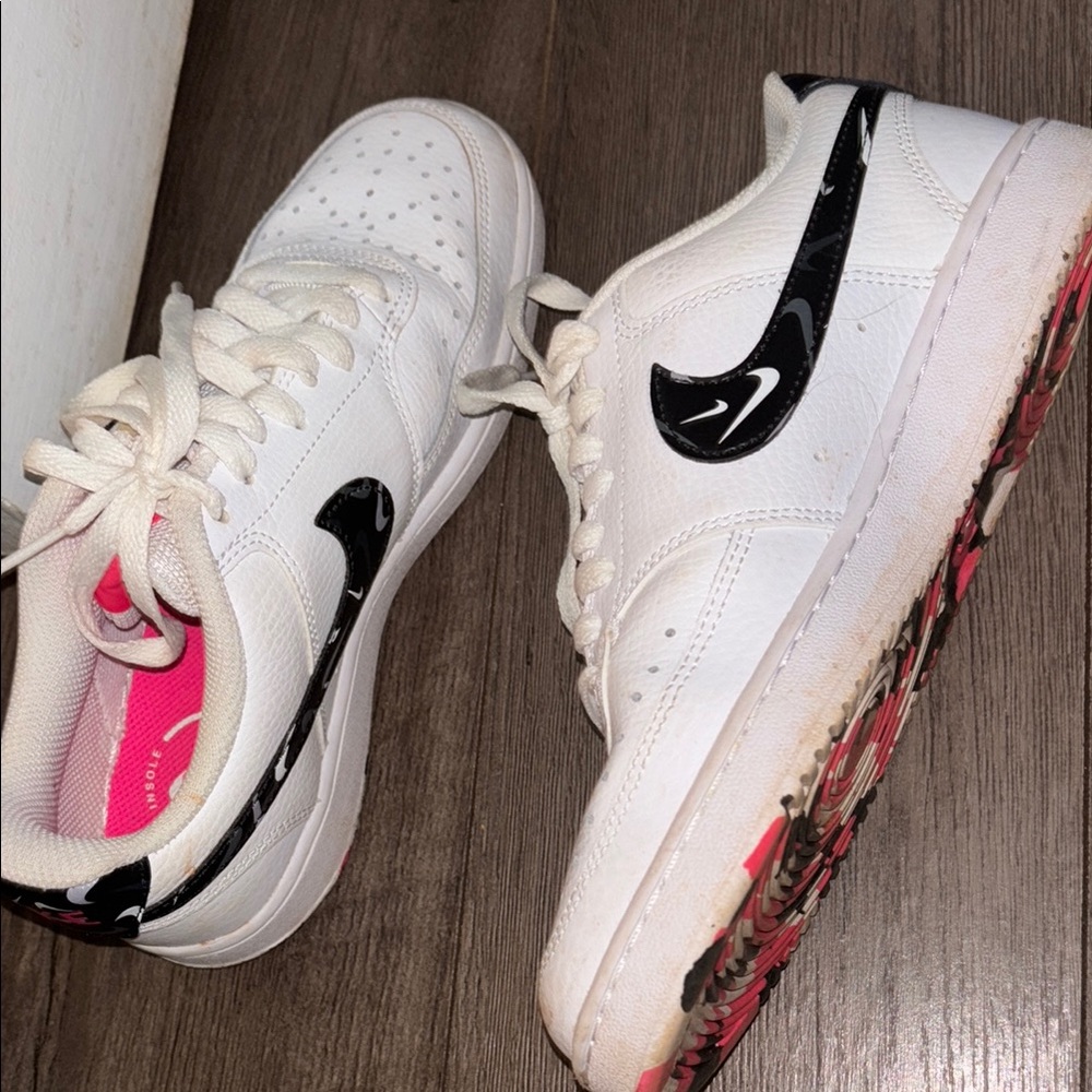 White and Black Sneakers with Pink Accents